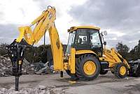 Трактор с гидромолотом CAT 428E