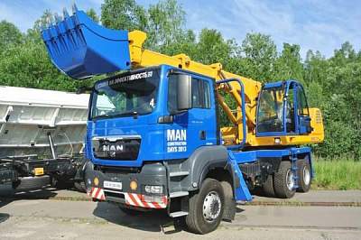 Экскаватор-планировщик MAN TGS UDS 114