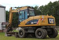 Колесный экскаватор Caterpillar M313D